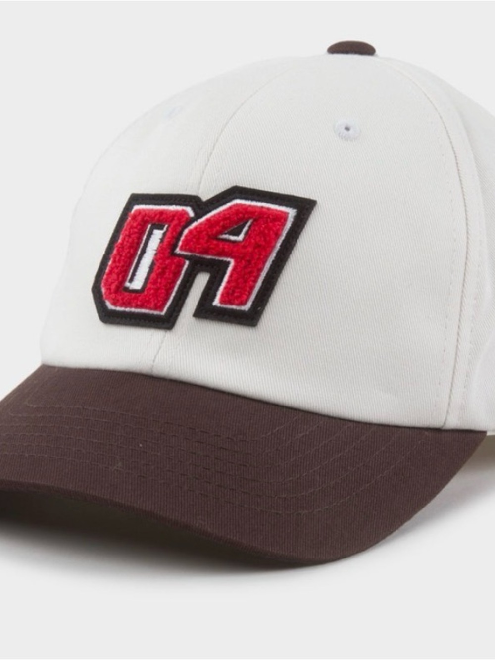 Brixton White Crown Baseball Cap with Red '04' Patch and Brown Brim
